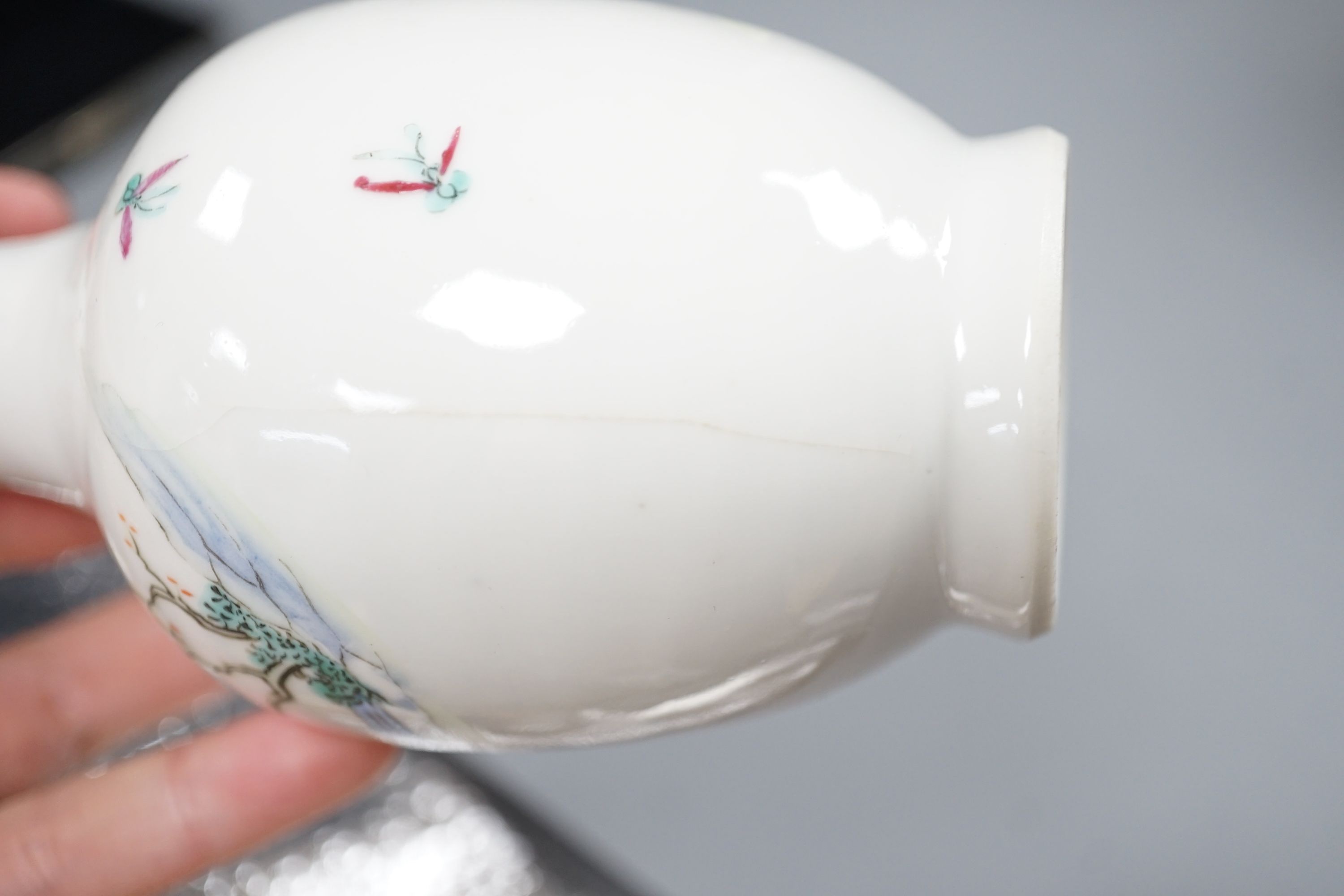 A Chinese blue and white sleeve vase and small famille rose vase, sleeve vase 25 cms high.